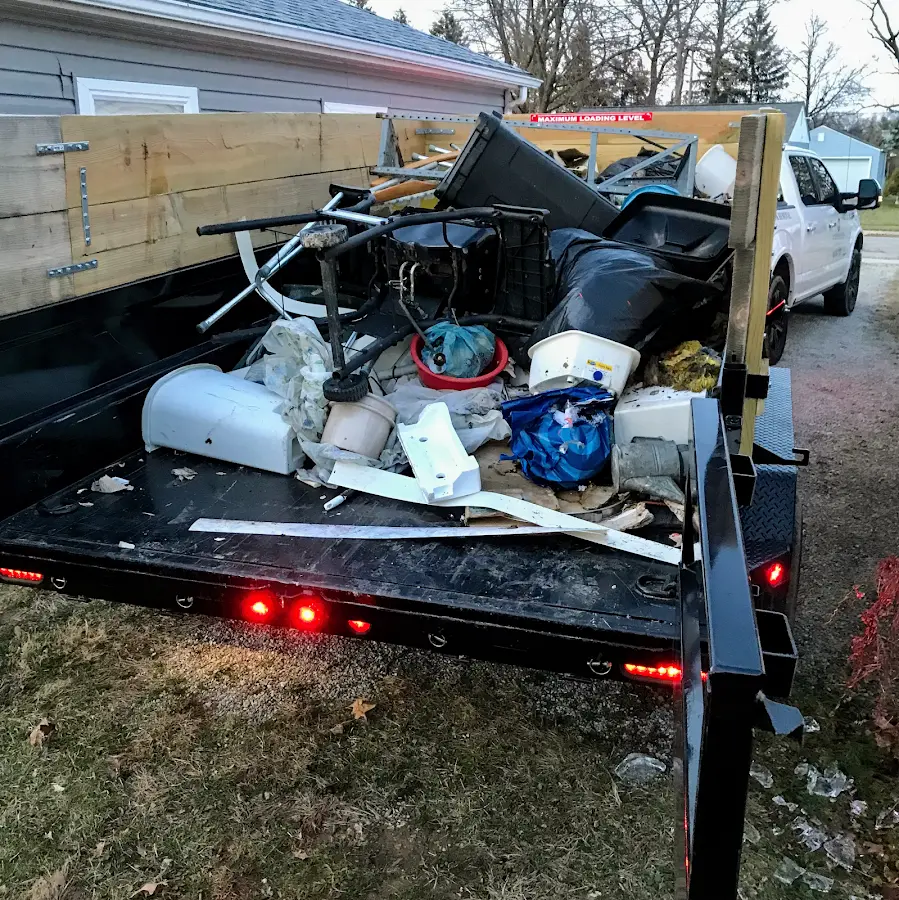 Roll-off dumpster delivered to a residential driveway in Kelly Ridge
